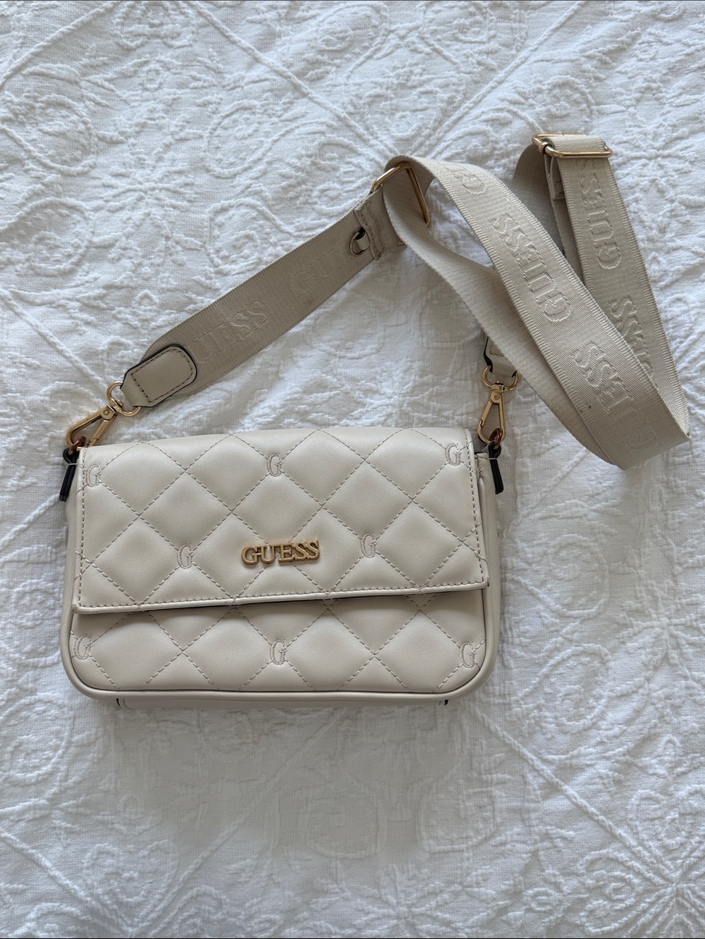 GUESS Quilted Crossbody Bag in Beige-Cream with Logo Strap